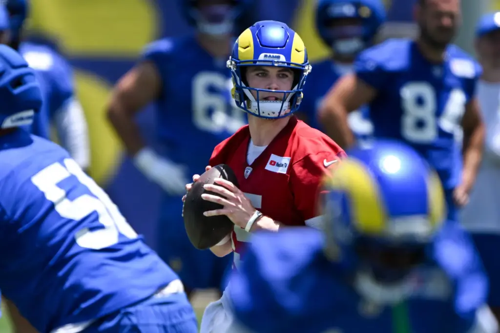 Rams rookie quarterback Ty Simpson looks to pass on during...
