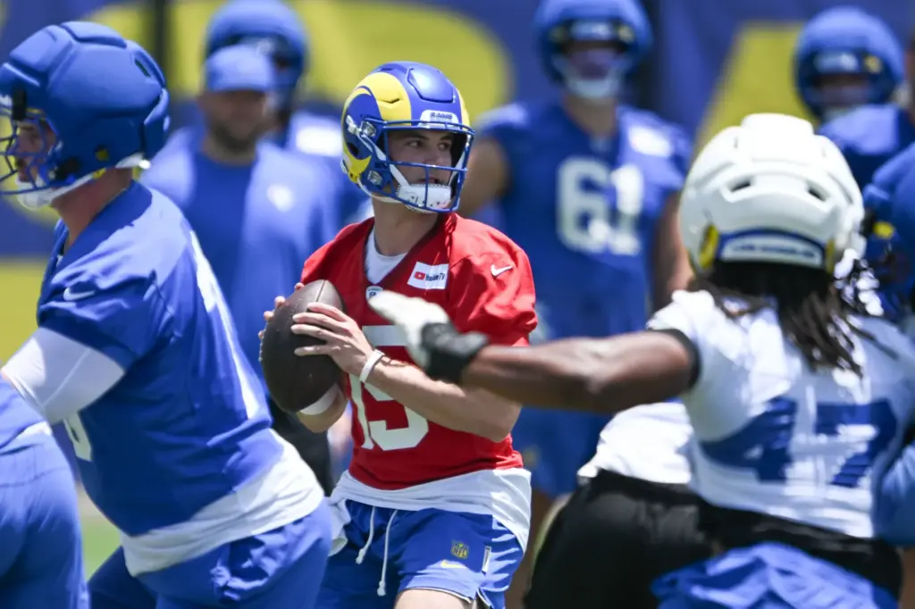 Rams rookie quarterback Ty Simpson looks to pass during an...