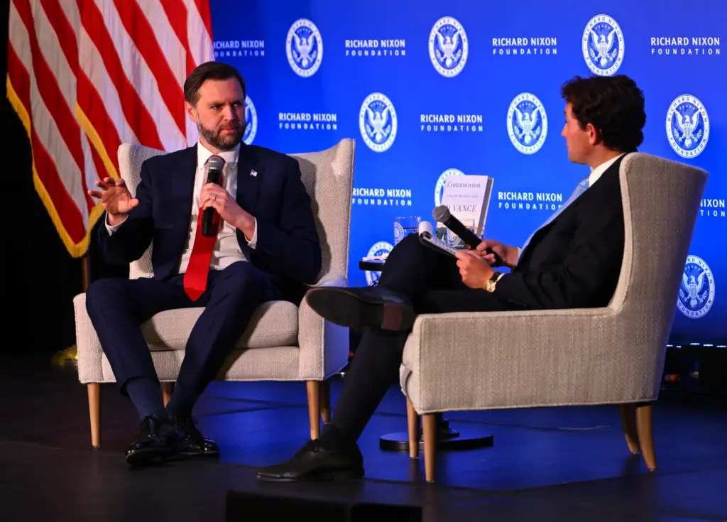 Vice President JD Vance chats with James Byron, President and...