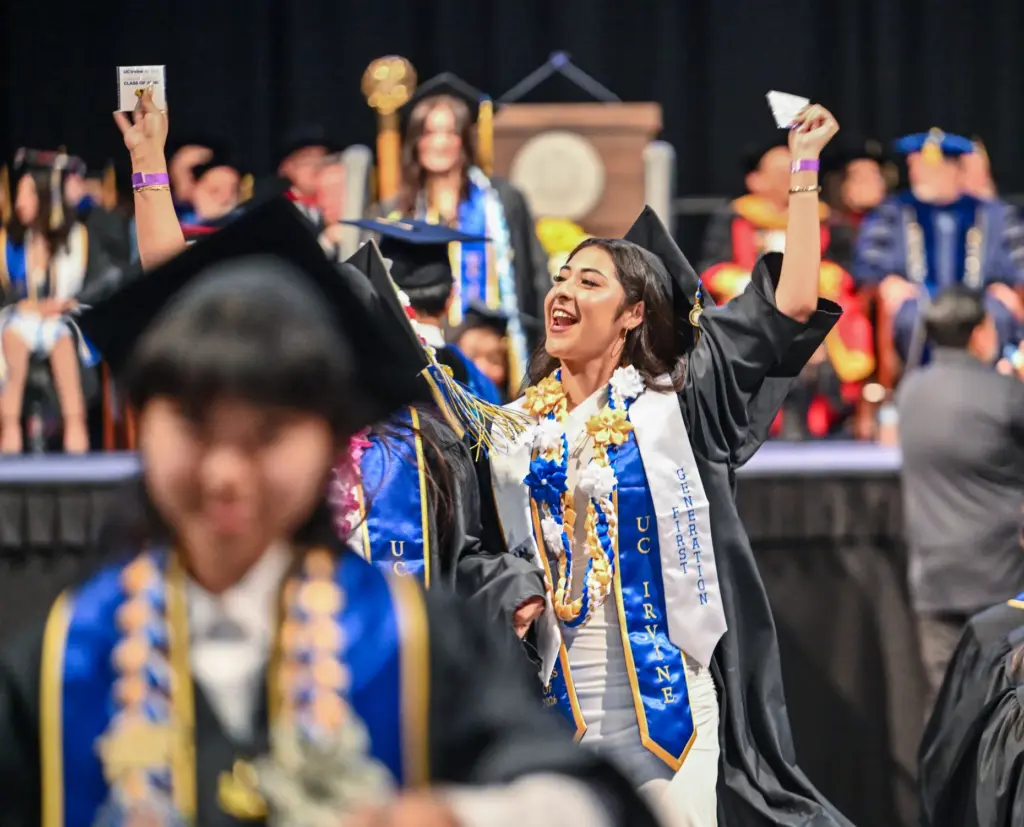 Graduates celebrate during the commencement ceremony for UC Irvineâs School...