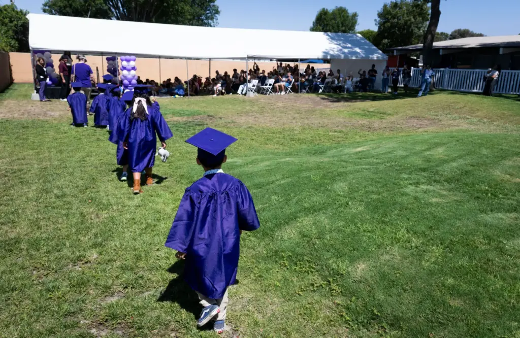 Students head to their preschool promotion ceremony at Beyond Blindness...