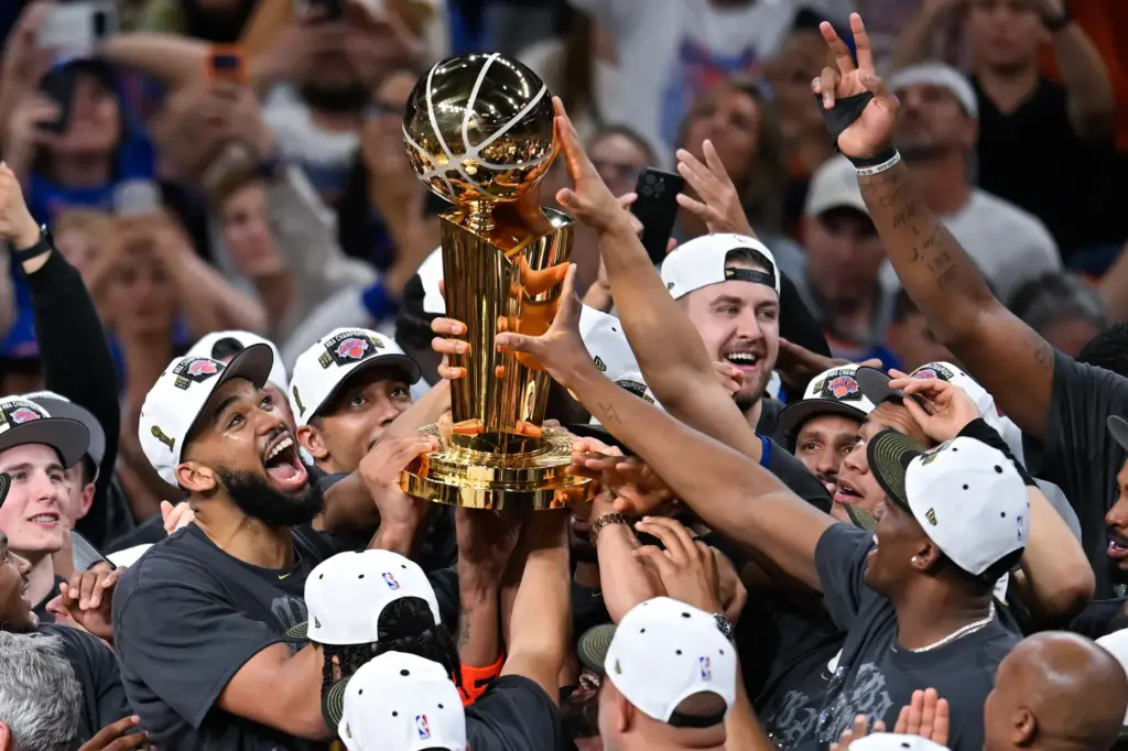 The New York Knicks celebrate with the Larry O’Brien Championship...