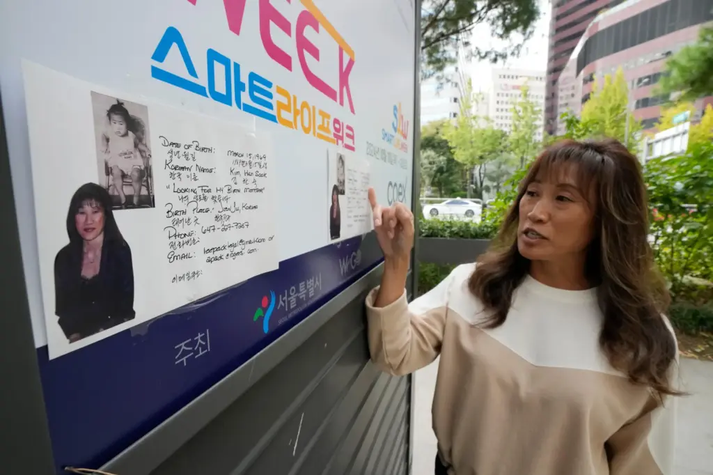 Angela Lee-Pack explains flyers with her photos.