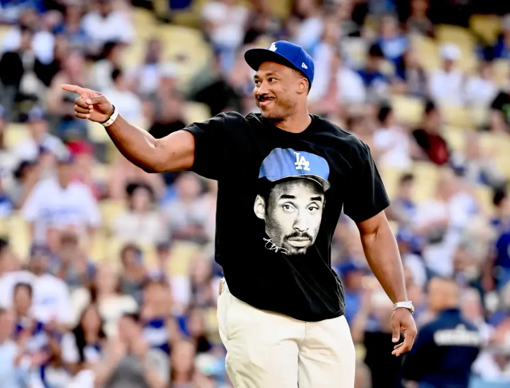 Rams Myles Garrett after throwing out the ceremonial pitch prior...