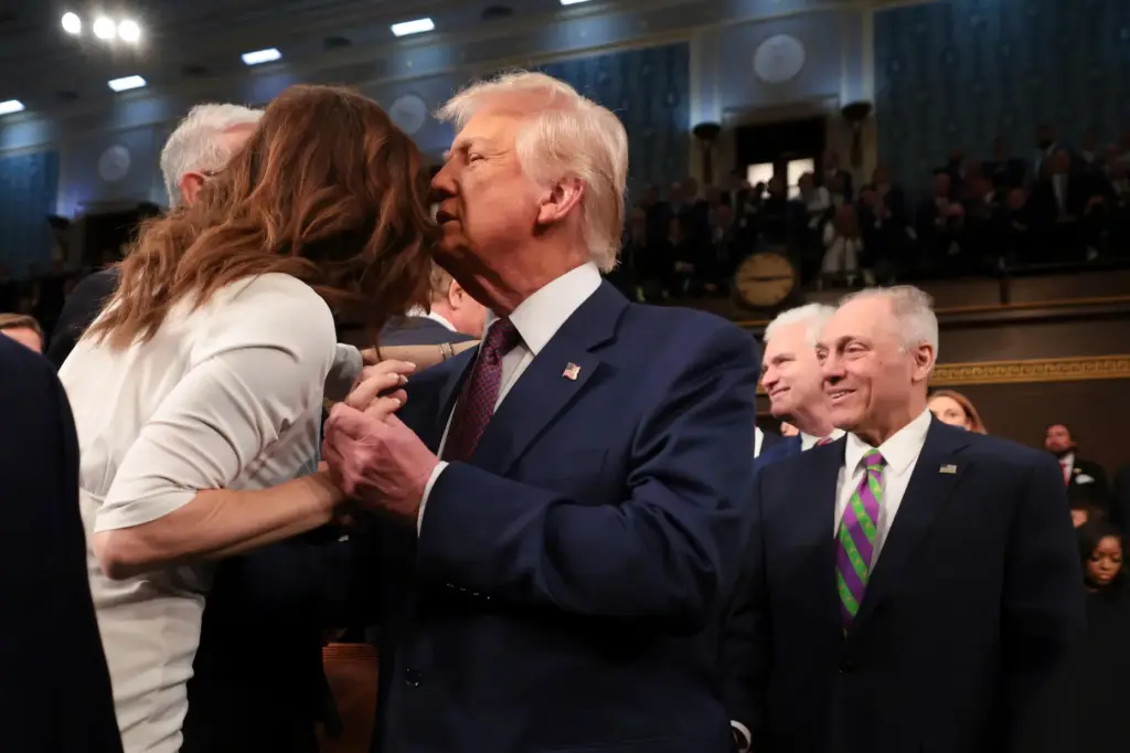 FILE – President Donald Trump embraces Rep. Nancy Mace, R-S.C.,...