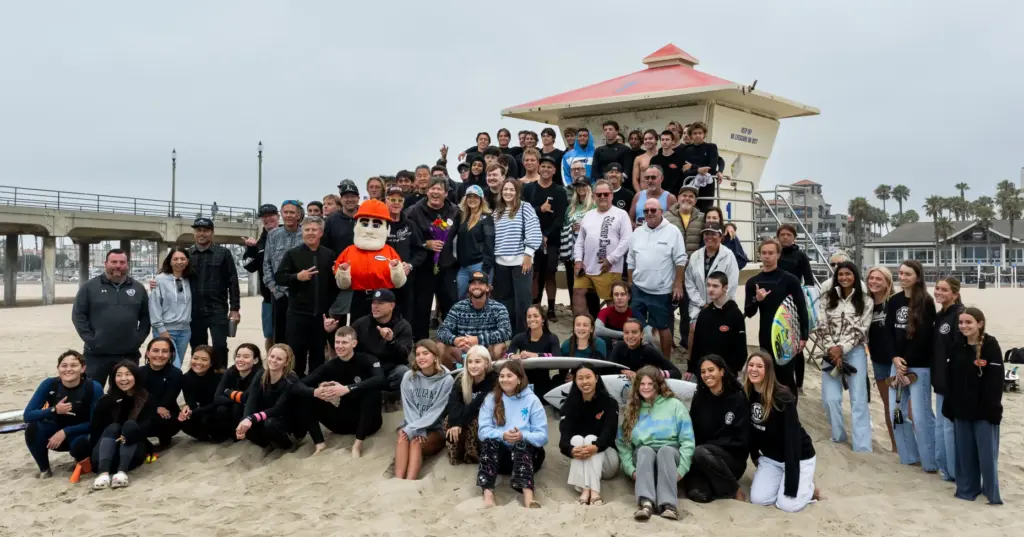 Huntington Beach High School surfing coach Andy Verdone and his...