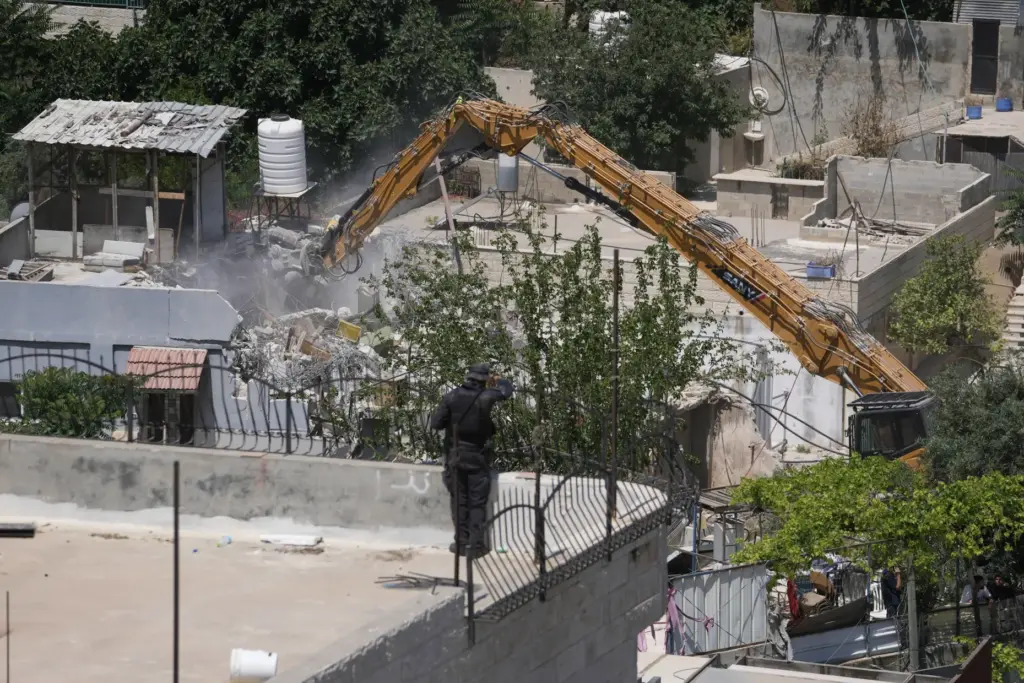 Israeli authorities demolish a Palestinian home in the Silwan neighborhood of east Jerusalem.