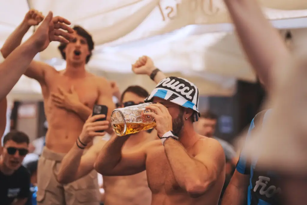 An Inter fan drinks a beer in the city center ahead of the Champions League final.