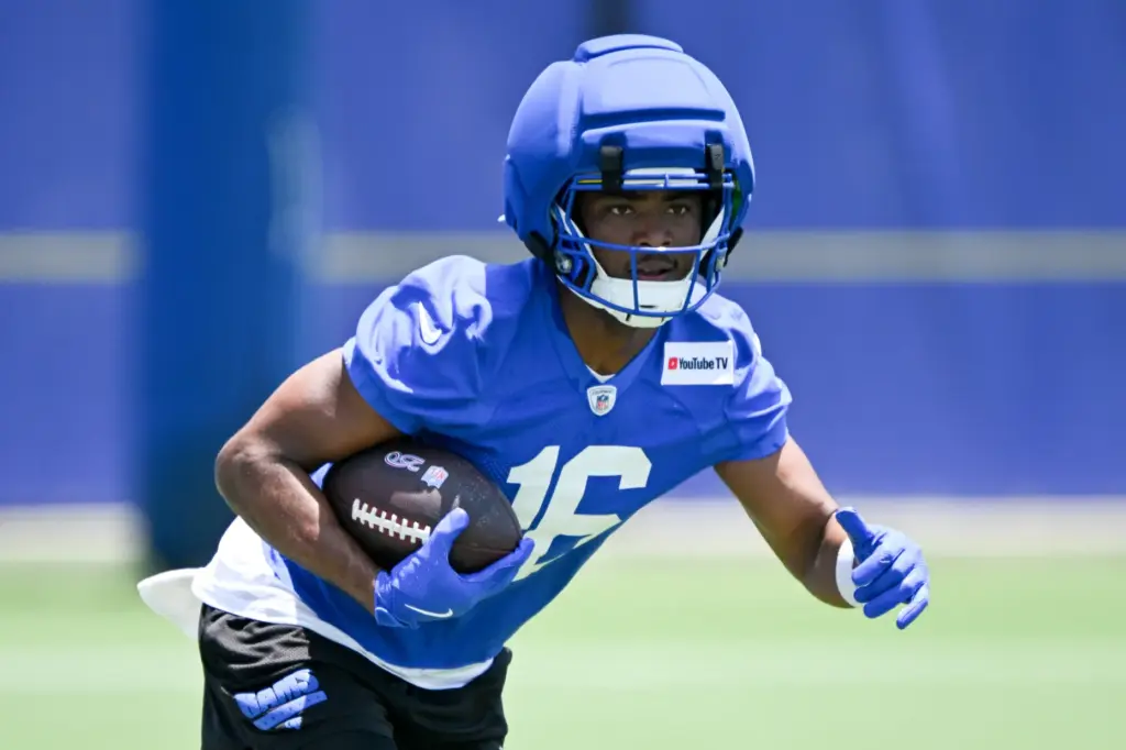 Rams wide receiver Tru Edwards goes through drills during an...
