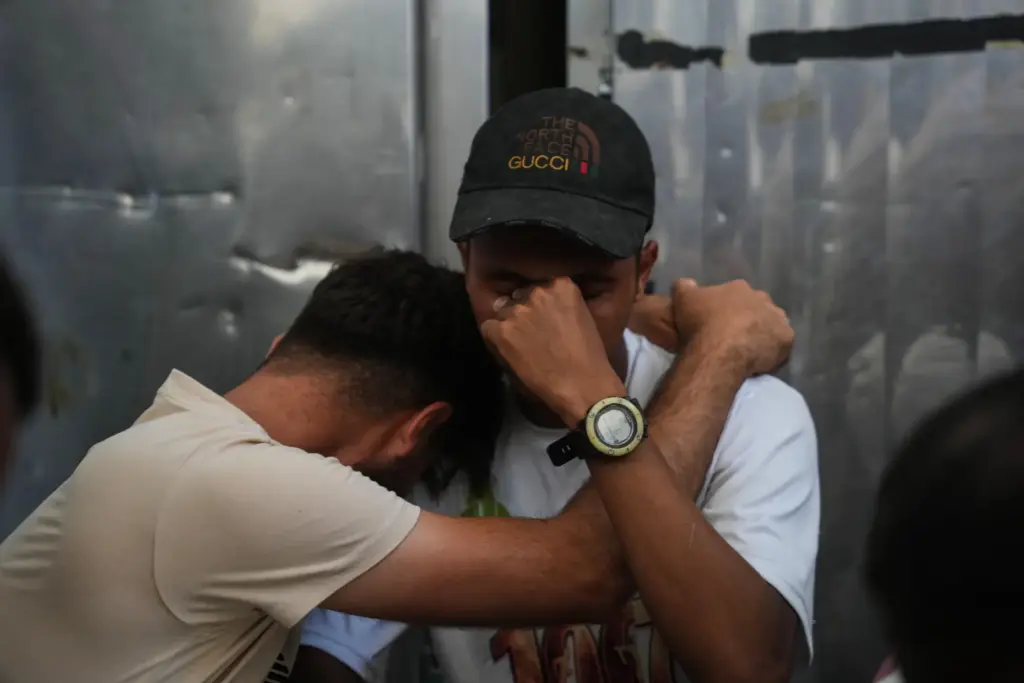 Palestinians mourn Ali Asbitan, 28, who was killed in an...