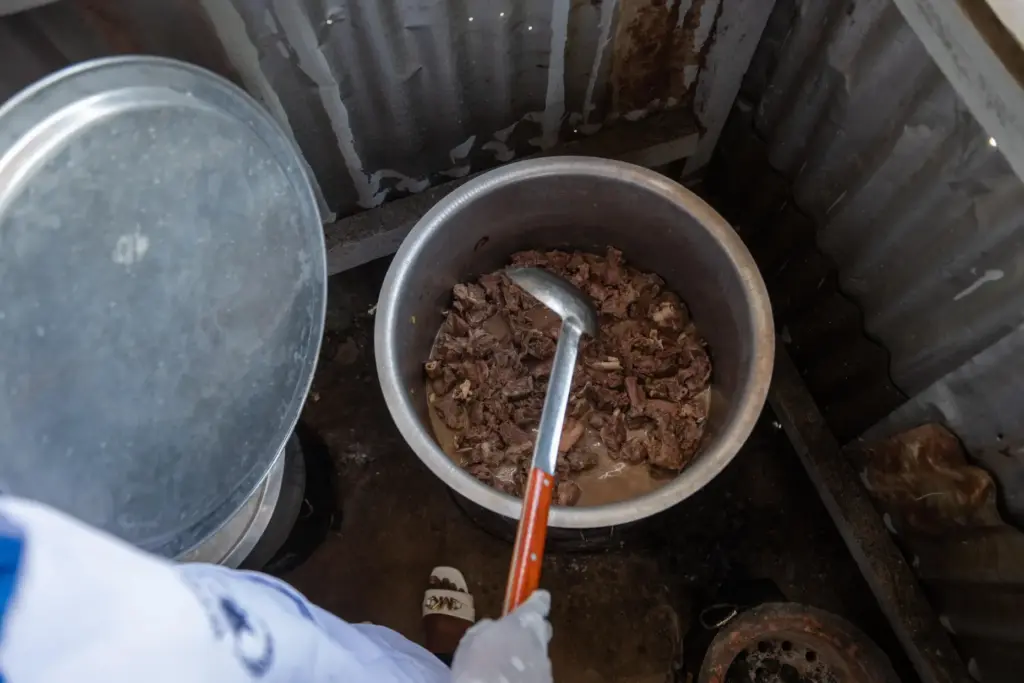 Arlette Basekawike prepares meals for Ebola patients.
