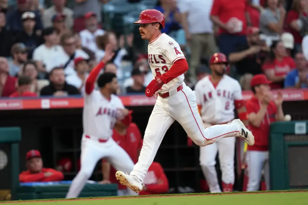 The Angels’ Wade Meckler runs home to score on Jo...