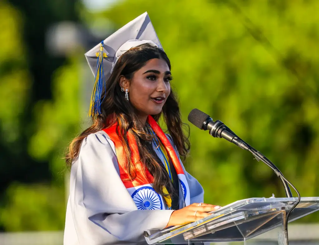Sanjana Sawant delivers one of the commencement addresses during the...