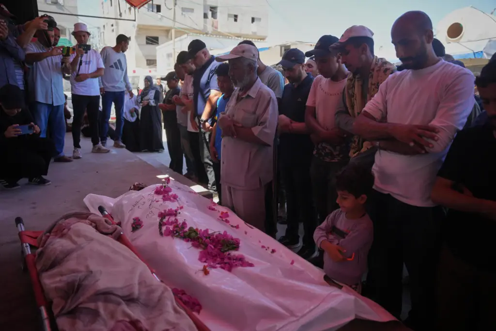 Palestinians perform funeral prayers for Ali Asbitan, 28, who was...