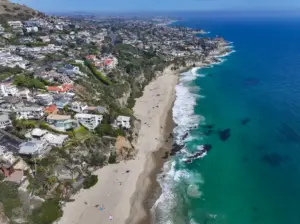Search underway for young girl swept into big surf off Laguna Beach