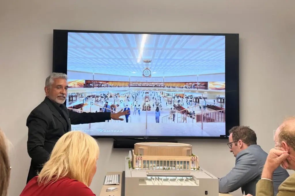 Vishaan Chakrabarti presents architectural designs during a presentation.