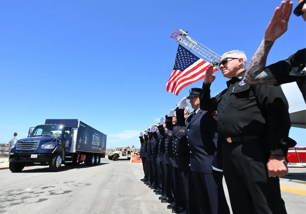 Huntington Beach firefighters join retired NYFD firefighters as a piece...