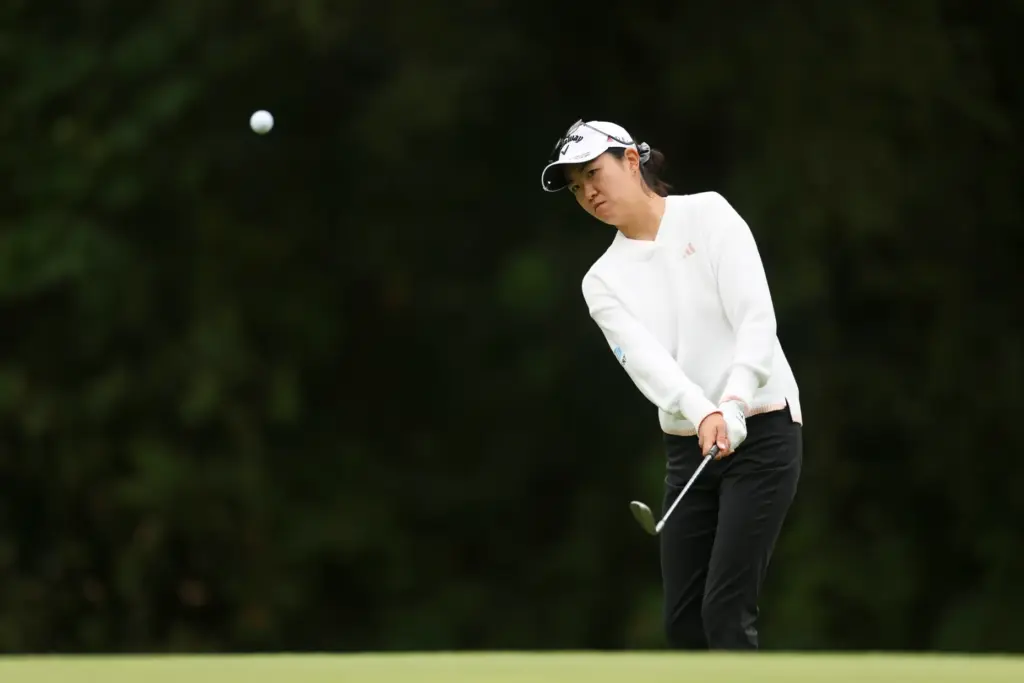 Rose Zhang plays a shot on the 11th hole during...