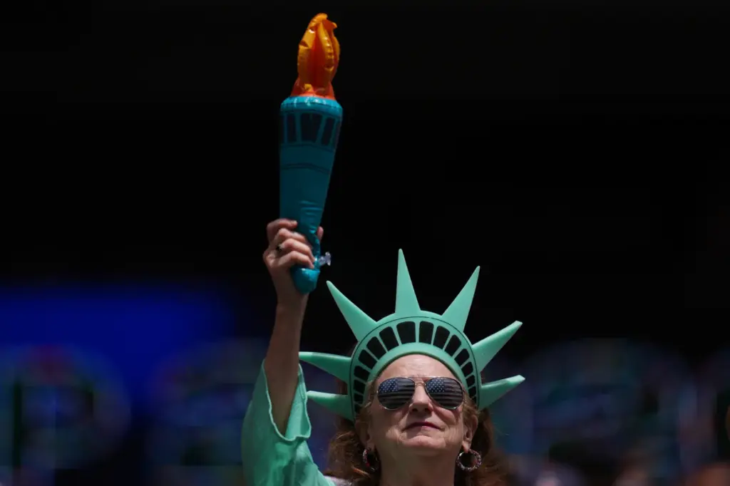 A US fan waits for the start of the World...