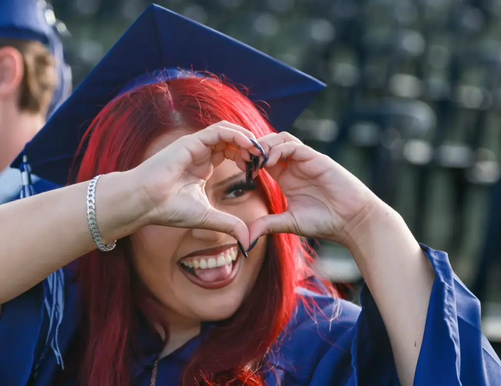 Madison Donis acknowledges her family in the crowd during her...