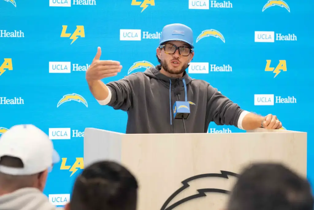 Chargers offensive coordinator Mike McDaniel speaks to the media during...
