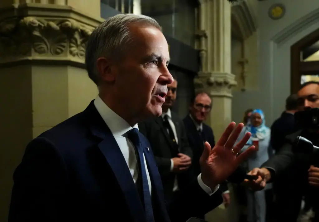 Prime Minister Mark Carney arrives to a caucus meeting in Ottawa.