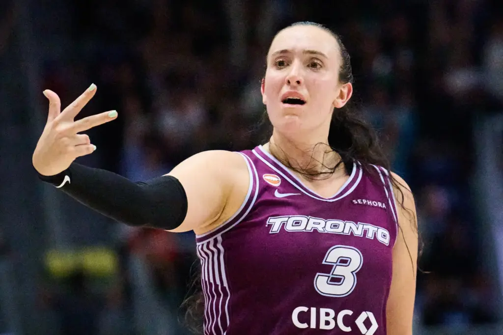 The Toronto Tempo’s Marina Mabrey gestures after scoring during the...