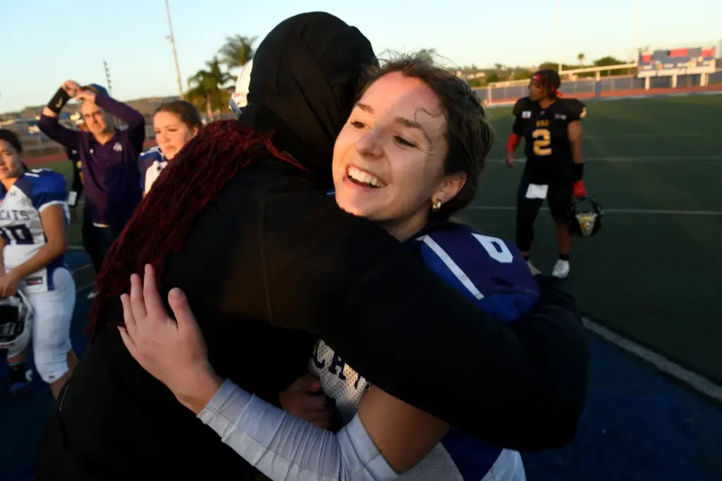 Cali War players greet their competitors after a loss against...