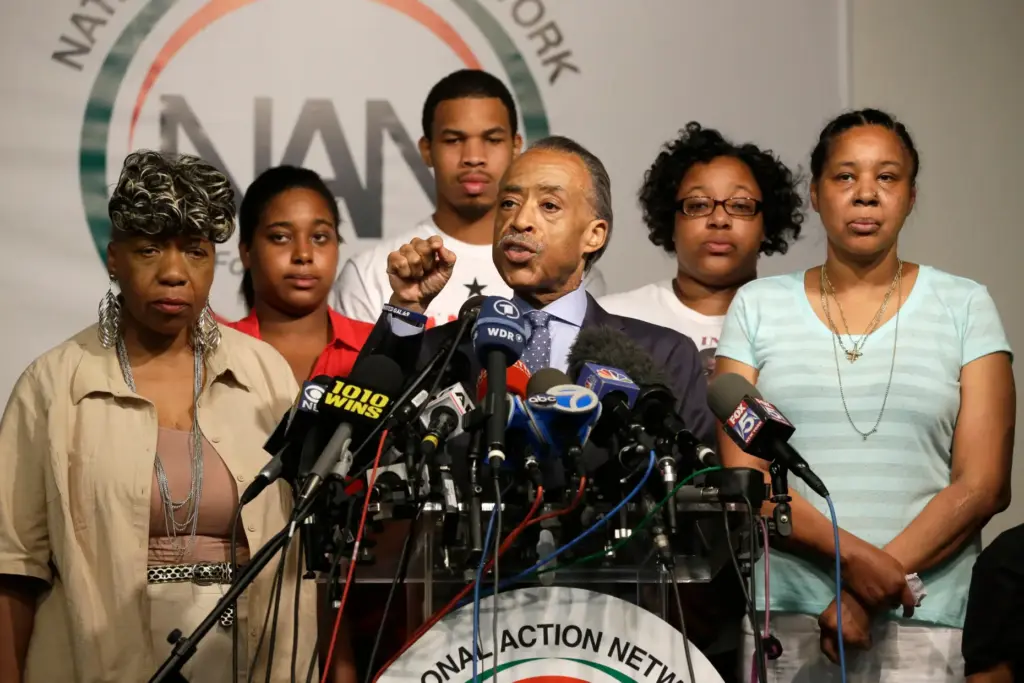 The Rev. Al Sharpton is joined by Eric Garner's mother, Gwen Carr.