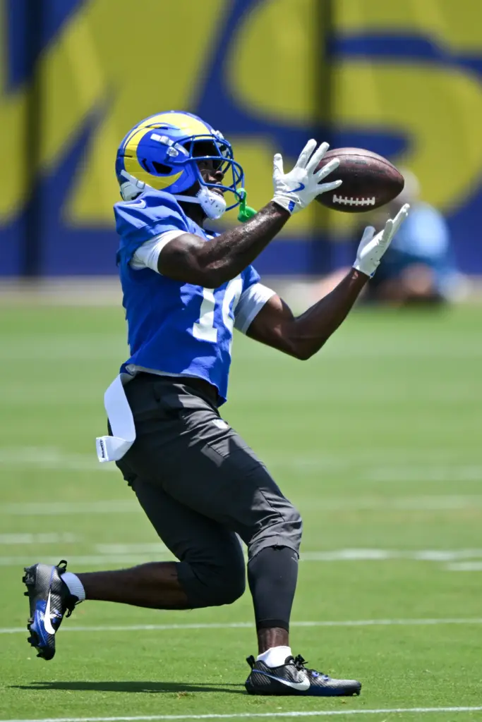 Rams wide receiver Mario Williams catches the ball as he...