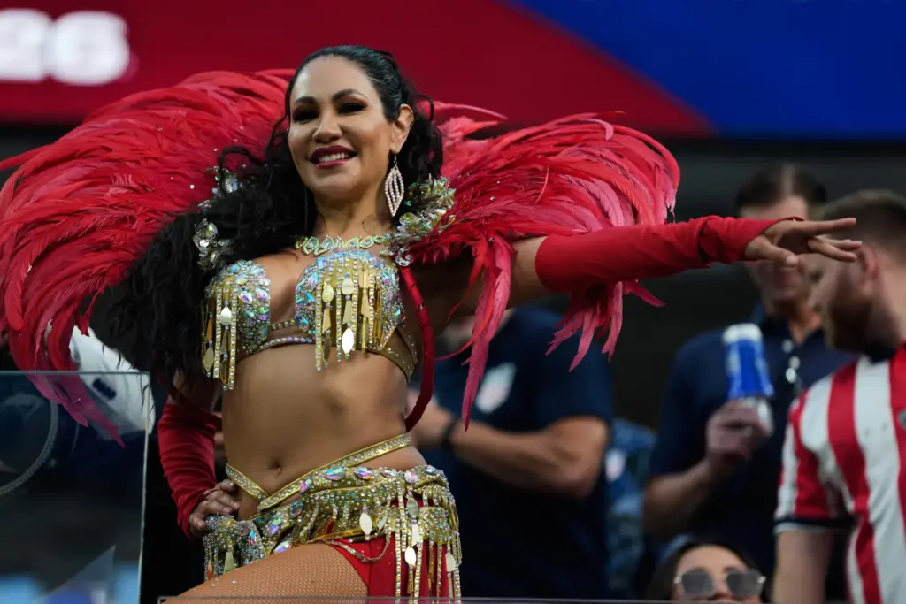 A fan cheers prior to the World Cup Group D...