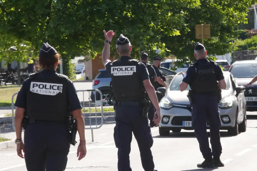 France Police officers control cars at a checkpoint ahead of the G7 summit.