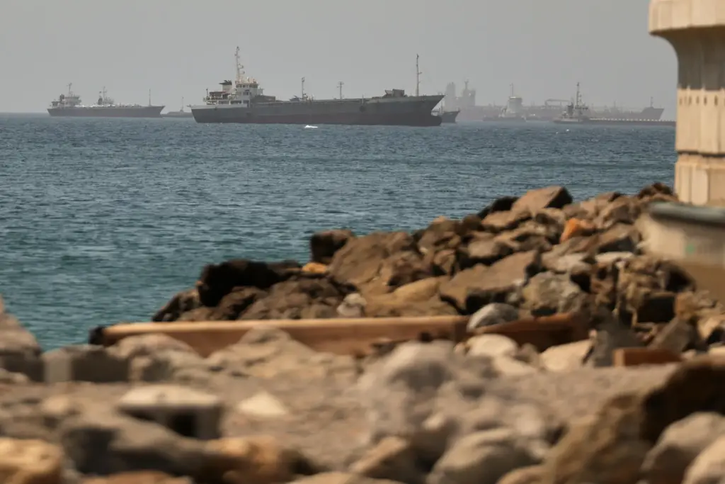 Tankers and cargo vessels are seen in the Gulf of Oman.