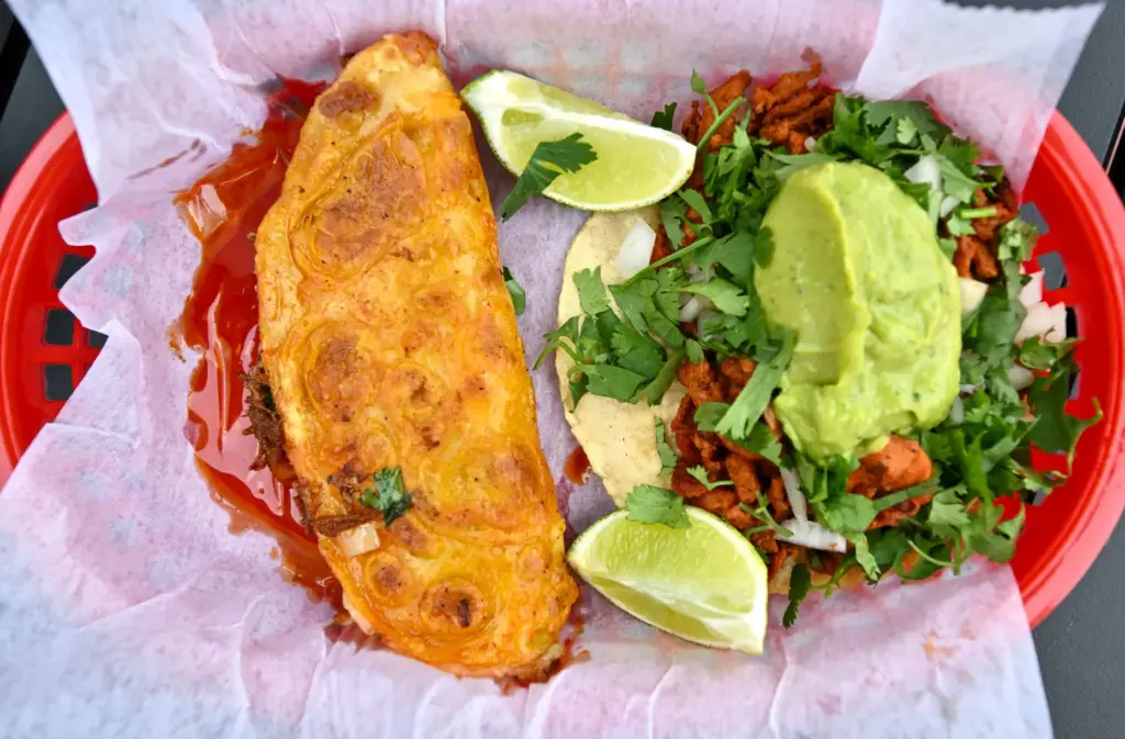 The two taco plate with al pastor and birria from...