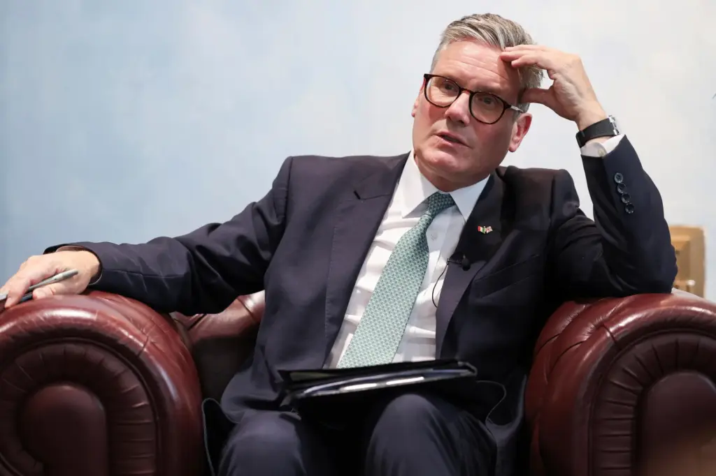 British Prime Minister Keir Starmer speaks to members of the media.