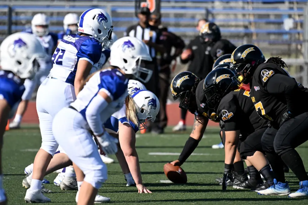 The Cali War women’s football team lines up against the...