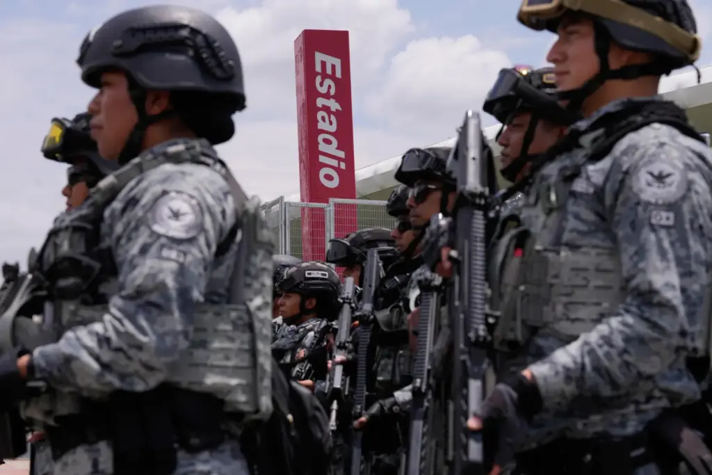 National Guard officers deploy outside a Guadalajara stadium.