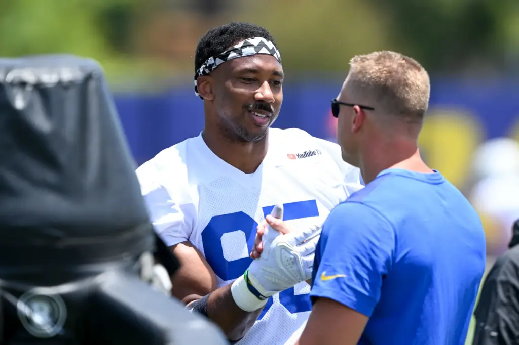 Newly acquired Rams defensive lineman Myles Garrett chats with an...