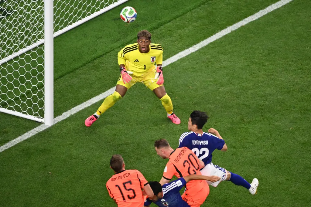 Japan goalkeeper Zion Suzuki (1) eyes the ball during the...