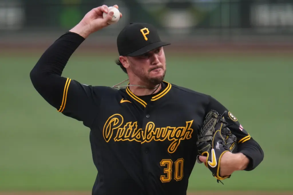 Pittsburgh Pirates starting pitcher Paul Skenes throws to the plate...