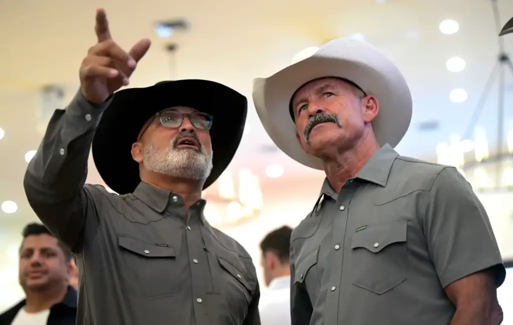 GOP gubernatorial candidate and Riverside County Sheriff Chad Bianco, right,...