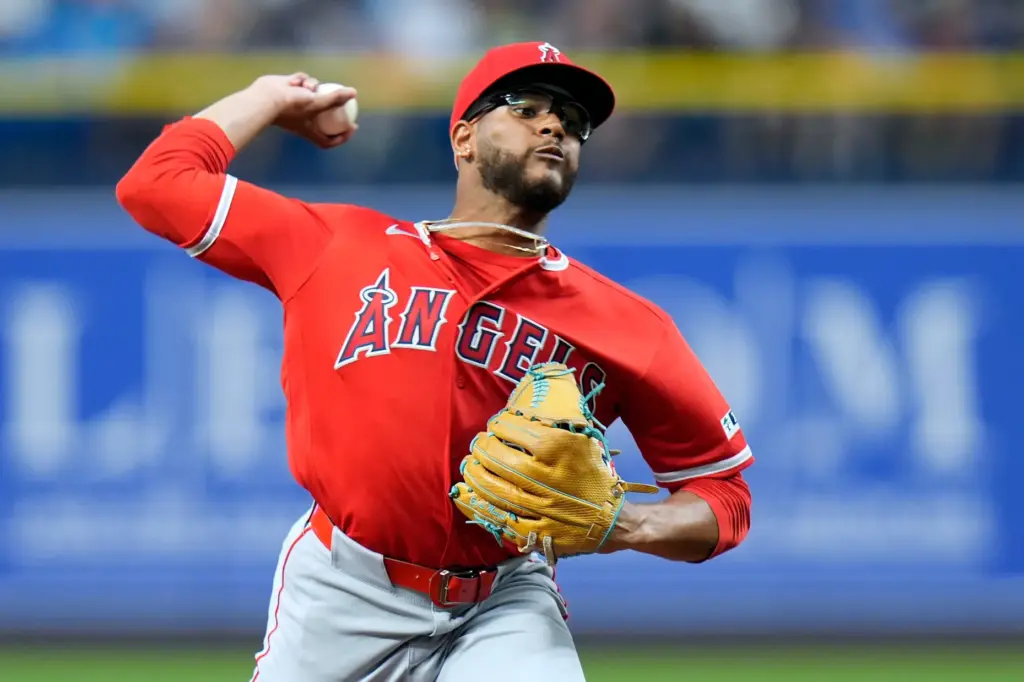 Angels starting pitcher Walbert UreÃ±a throws to the plate during...