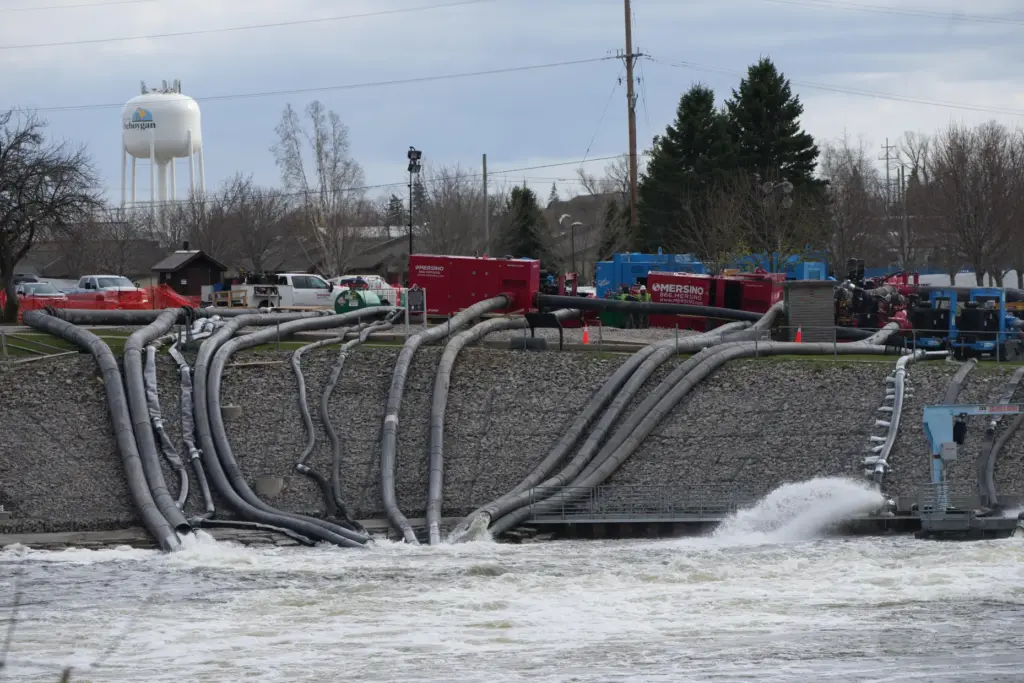 Pumps work at the Cheboygan dam.