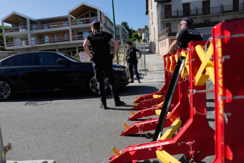 France Police officers control cars at a checkpoint ahead of the G7 summit.