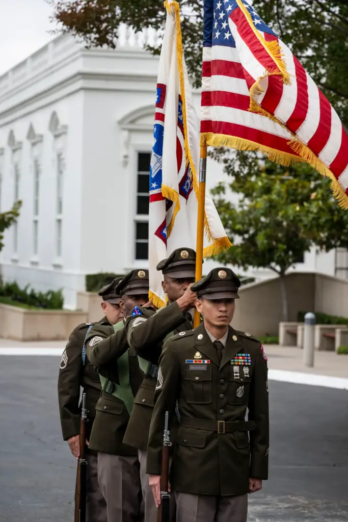 The US Army Honor Guard presents the colors during the...