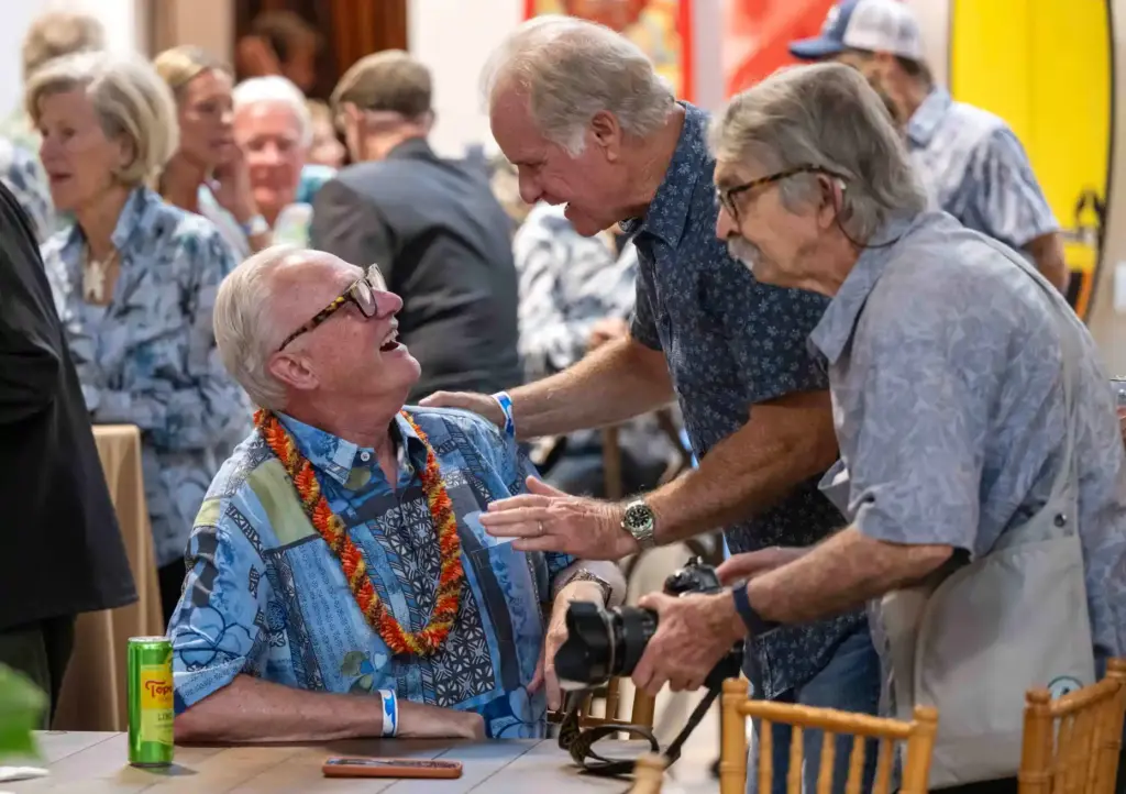 Spencer Croul, left, a co-founder of the Surfing Heritage and...