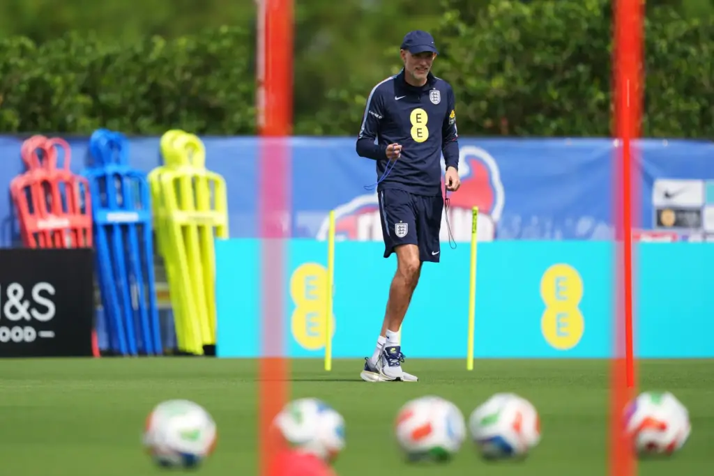 England’s head coach Thomas Tuchel walks on the practice pitch...