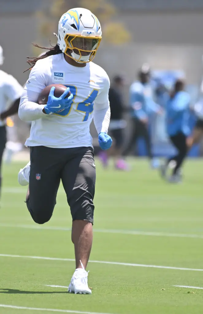 Chargers running back Keaton Mitchell (34) participates in a team...