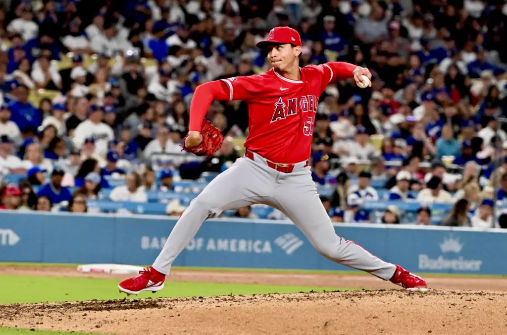 Relief pitcher Samuel Natera Jr. #52 of the Angels makes...