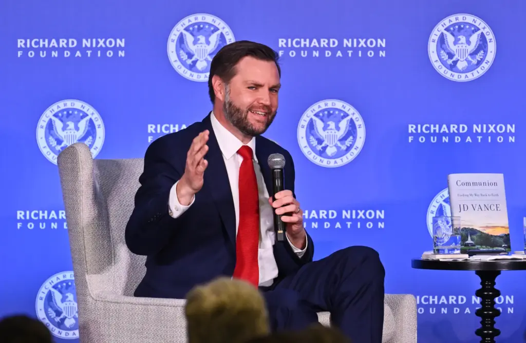 Vice President JD Vance chats with James Byron, President and...